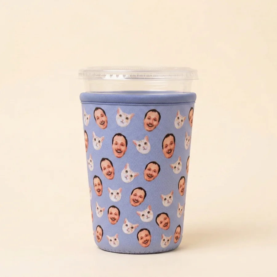 Periwinkle sleeve printed with repeating photo faces of a person and a cat